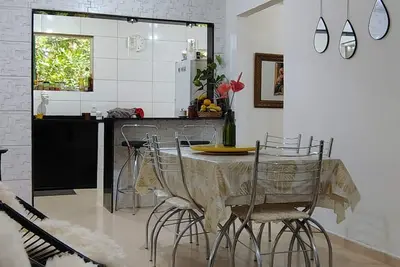 Image de House in Serra do Piloto with natural pool, waterfall runs throughout the property.