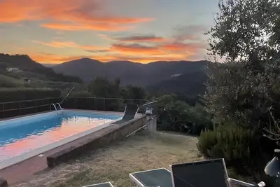 Image de Maison de vacances 'Al Settimo Cielo' vue sur les collines, terrasse privée, Wi-Fi, climatisation (jusqu’à 6 pers. )