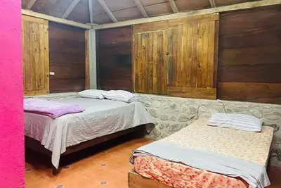 Image de Rustic cabin next to a stream in nature