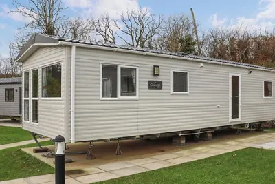 Image de 2 chambres à coucher à Pendine