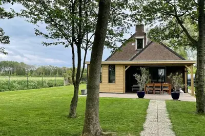 Image de Compleet huisje tussen de weilanden in Ewijk