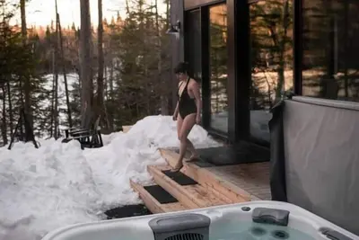 Image de Chalet Nyx - Bord de l`eau avec Spa et Sauna