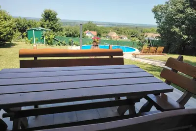 Image de Family-friendly countryside retreat with pool, jacuzzi, playground, and Danube views.