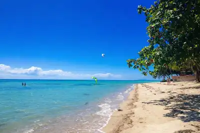 Image de \nWelcome Villa Garden a peaceful and spacious home surrounded by lush greenery.