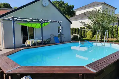 Image de 4 vraies chambres dans Villa 105 m2 avec poêle à bois et piscine  à Montfaucon