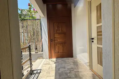 Villa Daphne with Sea View, Ac, Private Garden & Pool Access in Bitez