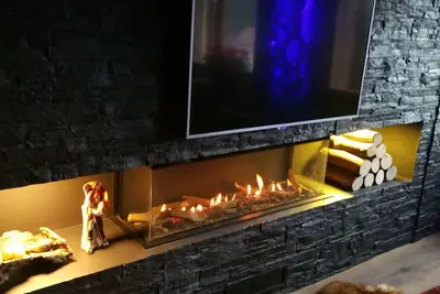 Image de Appartement 'Borredà' mit Kaminofen by Interhome