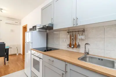 Image de Superior-Apartment mit einem Schlafzimmer in Strandnähe by Interhome