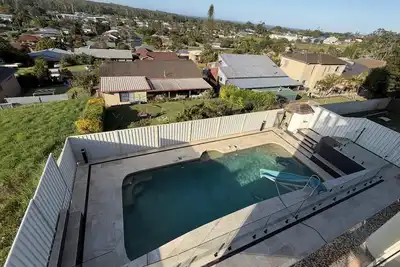Image de Family Coastal Retreat with Pool and Balcony Views