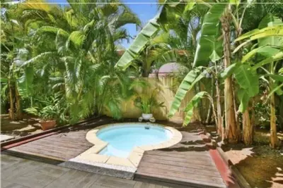 Image de A 200m de la plage, belle petite maison créole, terrain arboré et bac à punch