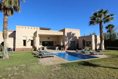 Image de Apple Garden, villa d'exception avec piscine privée. Proche Palmeraie, vue Atlas
