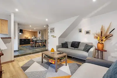 Image de Le Refuge de Campan – Centre Village : vue montagne, terrasse privée, parking privé, Wi-Fi