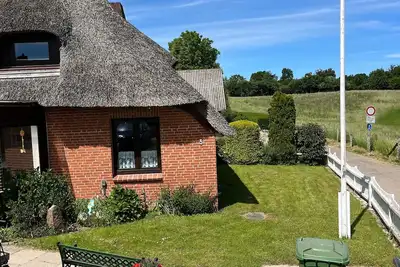 Image de Maison de vacances « Reethaus Kälberstieg » avec vue sur le lac, terrasse privée et Wi-Fi