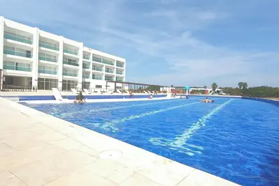 Image de Beautiful apartment with a spectacular view, private beach, and pool