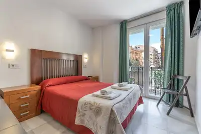 Image de Chambre « Habitación 101 » avec balcon, Wi-Fi et climatisation