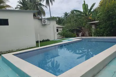 Image de 5-bedroom house with Ac Costa Azul with a Beautiful sandy beach.