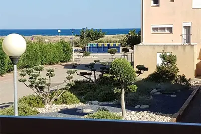 Image de Agréable duplex avec grande terrasse et parking privé à 100m de la plage