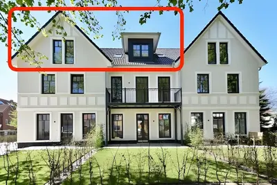 Image de Spacious Holiday Apartment in Villa StrandEins \"Lachmöwe\" with Garden View