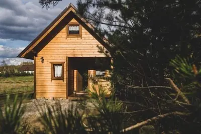 Image de Maison de vacances avec sauna et jacuzzi privés.