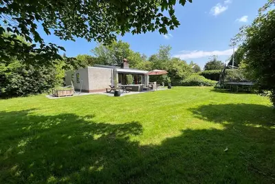 Image de Holiday bungalow Ruiterplaat, detached house with large garden and trampoline. A short walk from the water!