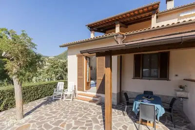 Image de One-bedroom apartment with garden & Lacona view