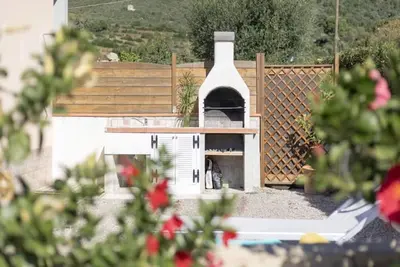 Image de One-bedroom apartment with garden & Lacona view