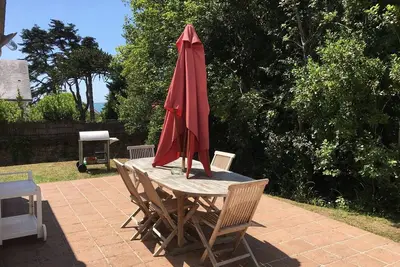 Image de Ambiance cosy et jardin arboré