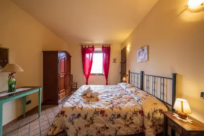 Image de Appartement 'Agriturismo Chianni - Quadrilocale' avec piscine, terrasse privée et Wi-Fi