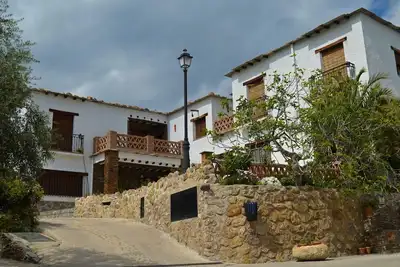 Image de Gemütliches Haus in einer Anlage mit Garten und Schwimmbad. by Interhome