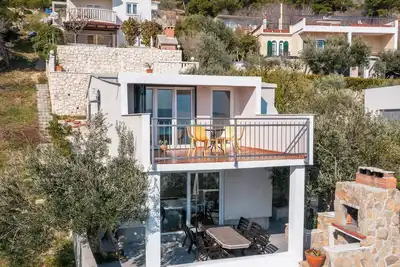 Image de Mirabilis - Privates Strandhaus by Interhome