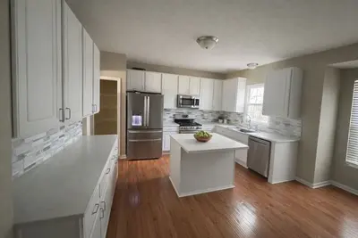 Image de Fully Furnished 6br Executive Home w/ Gym, Office & Ev Charger