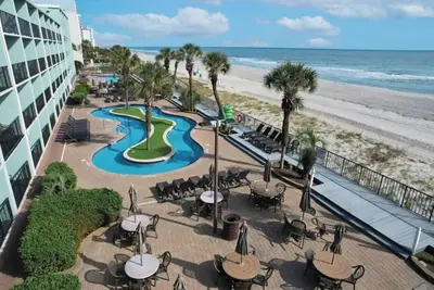Image de Myrtle Beach Oceanview | Pools, Hot Tubs, Bar + Steps to SkyWheel & Ripley’s