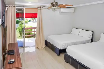 Image de 1 Min from Mbj Airport; Cozy Studio; Ac; Wi-Fi