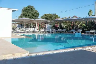 Image de Boomerang Apartments 2 – Design Suite con Piscina in Struttura Ricettiva ad Avetrana – a 5 minuti da Punta Prosciutto