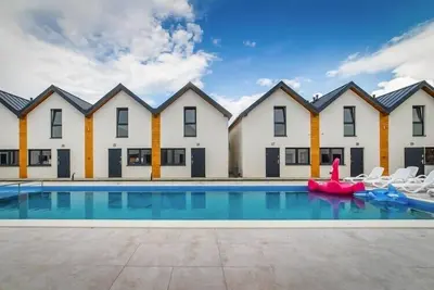 Image de Maisons de vacances confortables avec piscine
