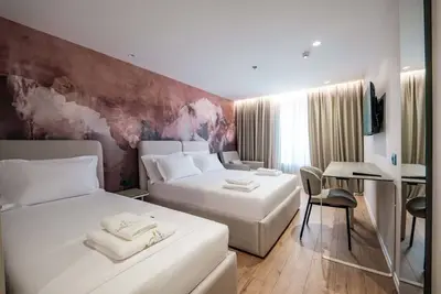 Image de Ermes Deluxe Triple Room with Sofa Bed