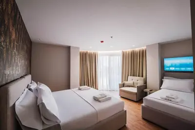 Image de Ermes Deluxe Triple Room with Balcony and Sofa Bed