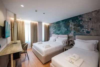 Image de Ermes Deluxe Triple Room