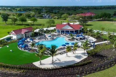 Image de Luxury vacation living with water views, golf & resort-style pools.