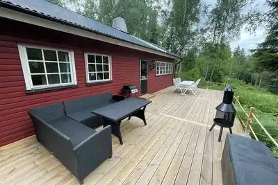 Image de Lovely forest holiday home with lake view