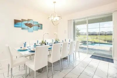 Image de Updated Luxury 7br/5ba villa in Championsgate  - no rear neighbors - pool/ Spa