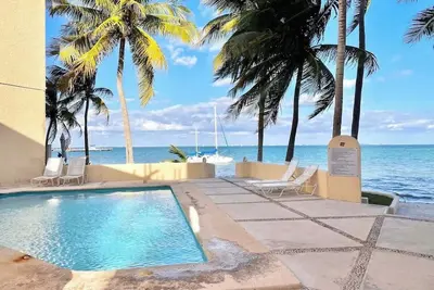 Image de Beachfront Apartment | Ocean Views + Pool Access