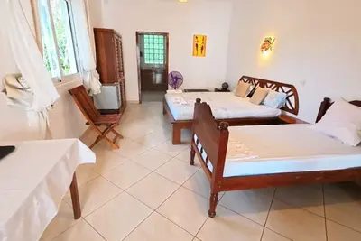 Image de Chambre Triple supérieur, Au 1er étage, Hôtel de charme avec piscine à Nosy Be