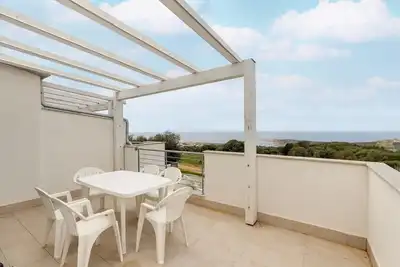 Image de Terrazza, aria condizionata e posto auto privato