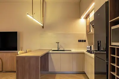 Image de Wabi Sabi themed 2 bedroom apartment with smart features.