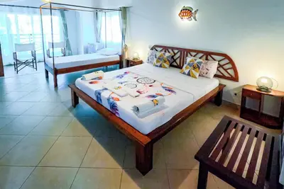 Image de Chambre triple supérieur, 2ème étage, Hôtel de charme avec Piscine, Nosy be