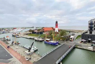 Image de Wellness with a harbor panorama: Your exclusive apartment for 4 people with private
