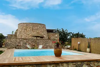 Image de Maison de vacances « Trullo Pinuccio » avec piscine privée, Wi-Fi et climatisation