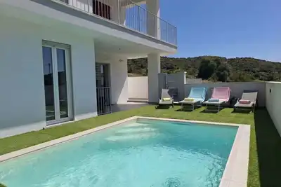 Image de Joli appartement pour 4 personnes avec Wifi, piscine privée, climatisation, Tv et terrasse