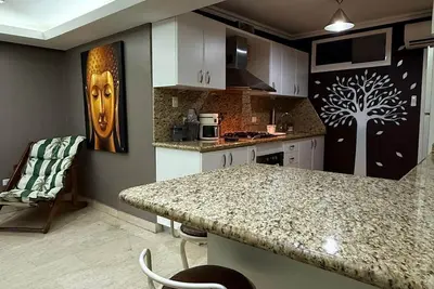 Image de Cozy 2-bedroom apartment in peaceful Caracas with Ac